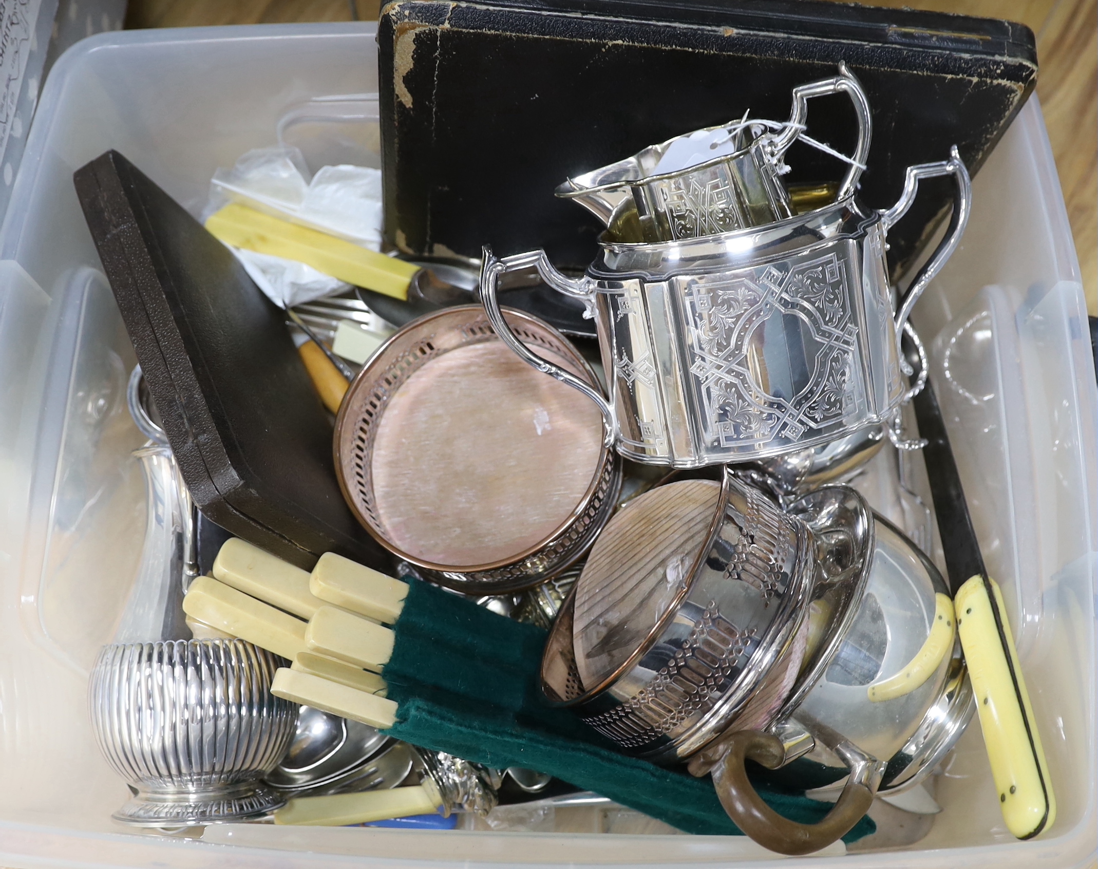 Sundry plated wares including cased set of silver handled knives, plated wine coasters and candlesticks